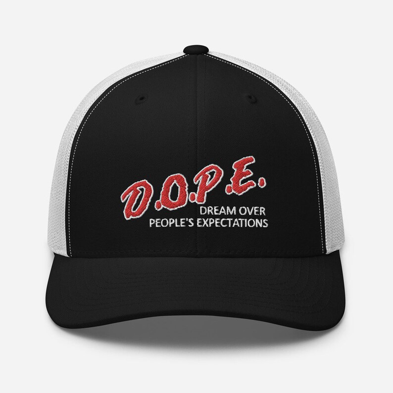 May include: Black and white trucker hat with a red embroidered logo that says "D.O.P.E. DREAM OVER PEOPLE'S EXPECTATIONS"