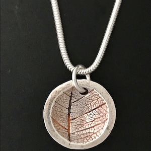 Oxidised leaf print on 18” sterling silver snake chain.
