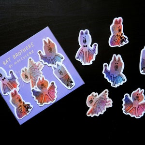 Zestaw naklejek Bat Brothers firmy Mocculere / Naklejki wycinane wielokrojowo / Impreza Halloweenowa, kolorowa, z połyskiem / Błyszczący papier winylowy z brokatem