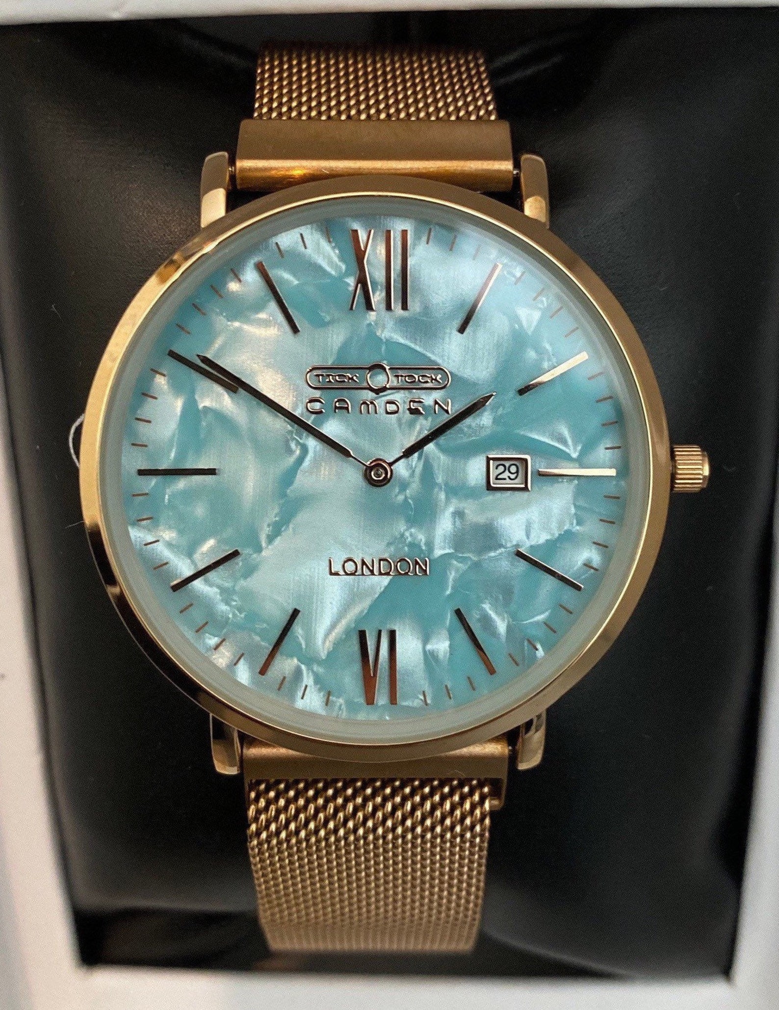 silver seashell watch