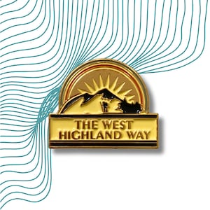 WHW West Highland Way Enamel Pin Badge Gold Sunbeams Behind Mountain & Walker