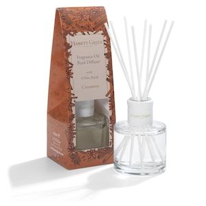 May include: A clear glass bottle with a white lid and 8 white diffuser sticks. The bottle is filled with a clear liquid and has a label that reads "Hassett Green London Fragrance Oil Reed Diffuser with 8 Fibre Reeds Cinnamon".