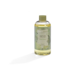 May include: A clear glass bottle with a green lid filled with yellow liquid. The bottle has a label that says "Hassett Green London" and "Fragrance Oil Diffuser Refill Black Forest 250ml e 8.45 US fl.oz."