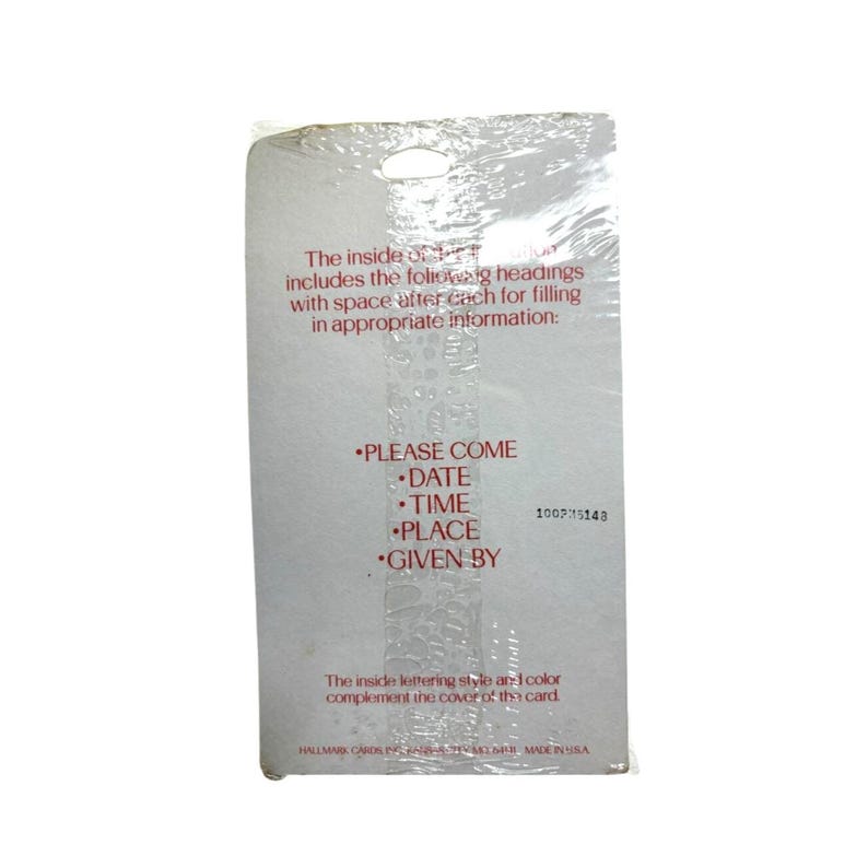 May include: A sealed Hallmark card with text that reads "PLEASE COME, DATE, TIME, PLACE, GIVEN BY." The card's text is in red, and the packaging is clear plastic. The card is white with a small hole at the top.