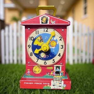 Fisher price teaching clock - Etsy 日本