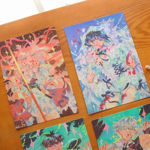 May include: Four art prints displaying colourful anime-style illustrations. The prints feature characters with vibrant hair and clothing, set against dynamic backgrounds with splashes of colour. The artwork has a fantasy theme.