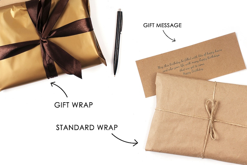May include: Two gift wrapping options are shown. One is a gold gift wrap with a brown ribbon. The other is a brown paper gift wrap with twine. A handwritten gift message is included on a brown card. The message reads: "May this birthday be filled with lots of happy hours and also your life with many happy birthdays that are yet to come. Happy Birthday."