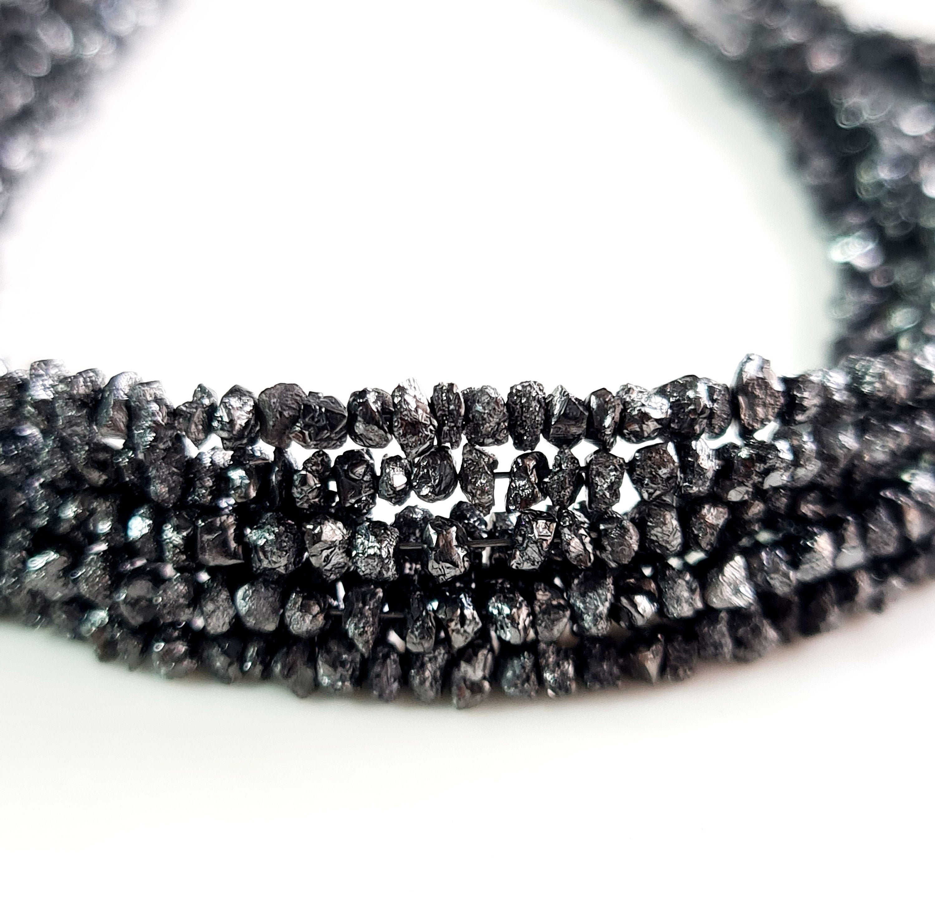 未加工のブラックダイヤモンドストランド：カットされていない貴重な