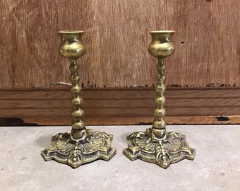 2 candelabros de latón antiguo