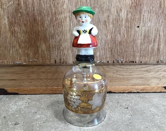 Vintage Alemania Occidental Crystal Goebel Bell con etiqueta de papel frustrado original, campana de vidrio con mango de niña, pintura a mano dorada uvas y hojas