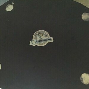 May include: Black and white round decorative plate with a sticker that says "Waterfront Line Faro Collection Fine China"