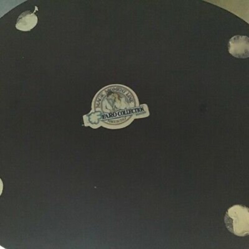 May include: Black and white round decorative plate with a sticker that says "Waterfront Line Faro Collection Fine China"