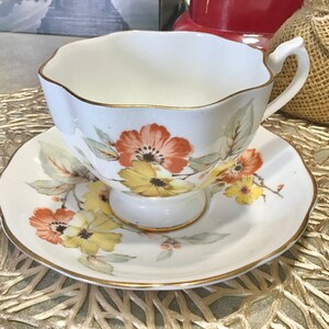 Vintage Queen Anne Bone China Cup and Saucer Set: Floral Tea Party