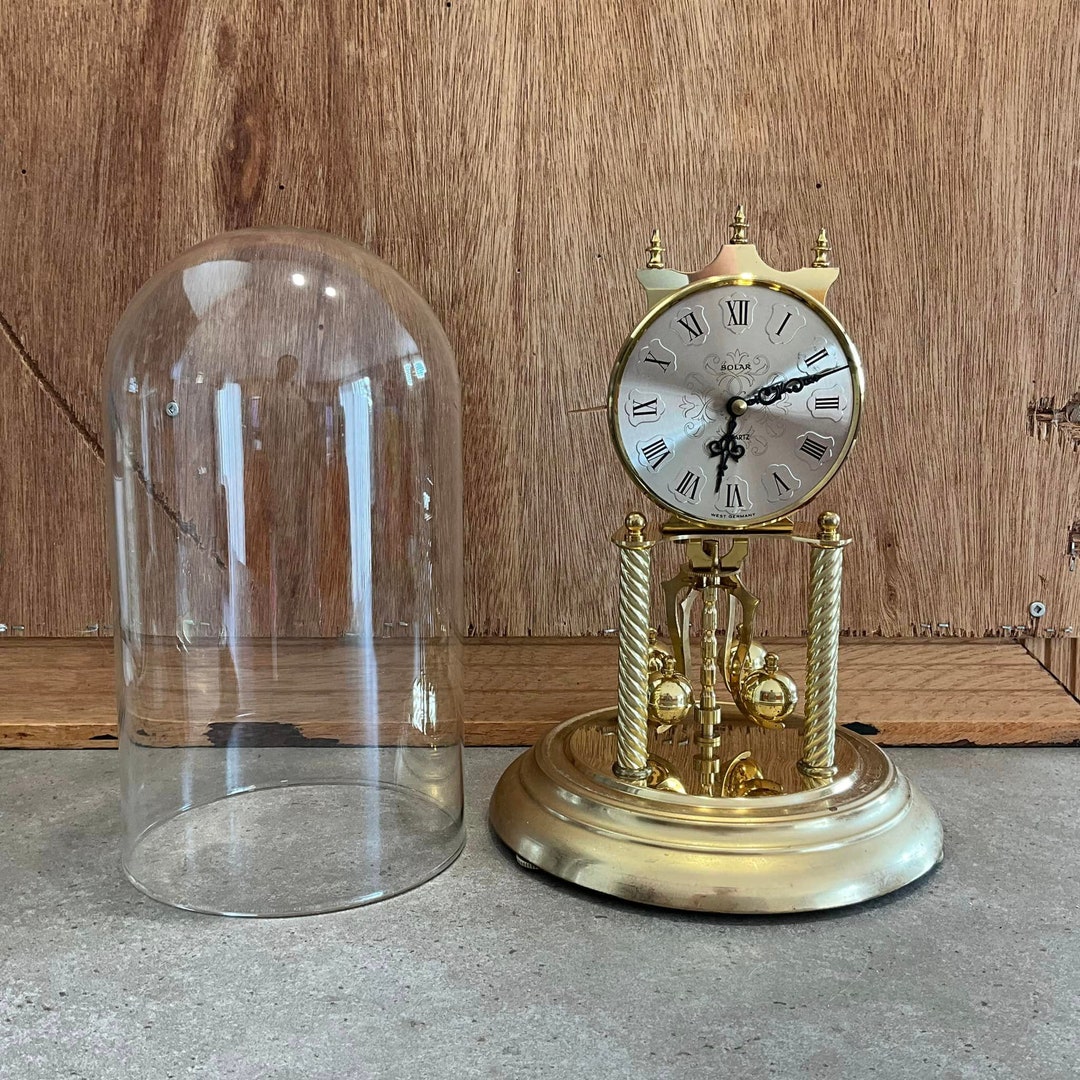 ガラスドーム付き金色振り子時計 ガラスドーム付き金色振り子時計