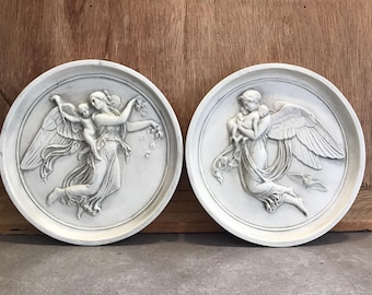 2 Angel Round Wall Plaques Angels Flying With Little Baby Angels