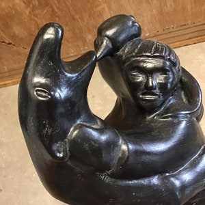 Vintage Ceramic sculpture of an Inuit man fighting a polar bear