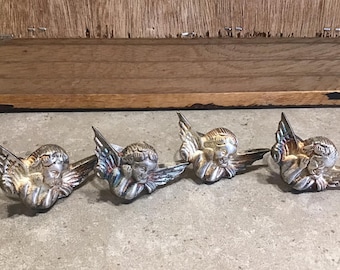 Servilleteros vintage con forma de querubines y ángeles, chapados en plata, hechos en la India (juego de 4)