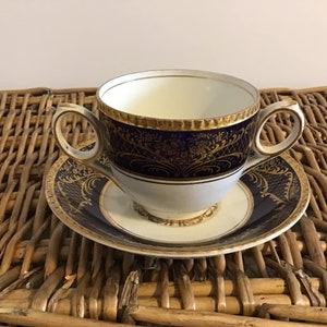 Vintage BOOTHS Bone China Teacup and Saucer: England, Double Handle