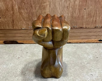 Raised Fist Sculpture of Hand-Carved Wood