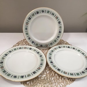 3 Royal Doulton Plates Made in England.