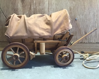 lampe de roue de wagon occidental en bois vintage, wagon couvert de camp de cowboy