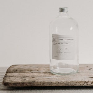 Botella de detergente líquido de vidrio transparente de 1 l, para almacenamiento en el lavadero, etiqueta personalizada, botella impermeable con tapa de rosca plateada, lujo ecológico