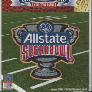 May include: An embroidered patch featuring a silver trophy with the text "Allstate Sugar Bowl" and the logo of "The Emblem Source".