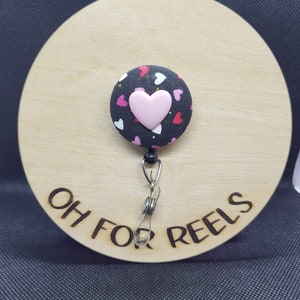 Hearts galore badge reel