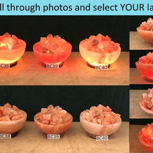 May include: Six Himalayan salt lamps in various sizes and shapes, each with a warm orange glow. The lamps are labelled BC38, BC39, and BC40. Scroll through photos and select YOUR lamp!