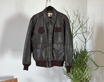 ジャケット・アウター 80s CHEVIGNON military jacket riri zip Chevignon Vintage 80s' Leather Airflyte Jacket A2 US.ARMY