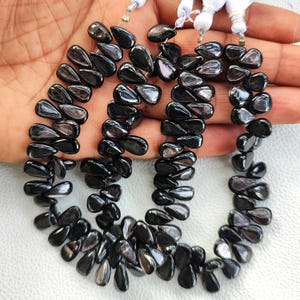 Kanadas gyllene glans hypersten 10x6-11 x 7 mm släta pärlformade pärlor 8,5 tum sträng