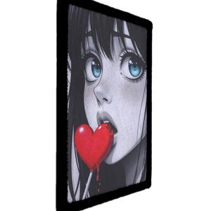 May include: A black and white anime-style patch featuring a girl with large blue eyes and a red heart-shaped lollipop. The lollipop is dripping, adding a touch of drama to the design. The patch has a black border.