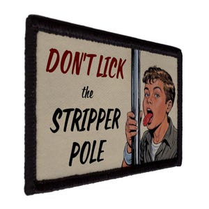 May include: A rectangular patch with a black border, featuring the text "DON'T LICK the STRIPPER POLE" in red and black. The image includes a comic-style illustration of a man with his tongue out, holding a pole.