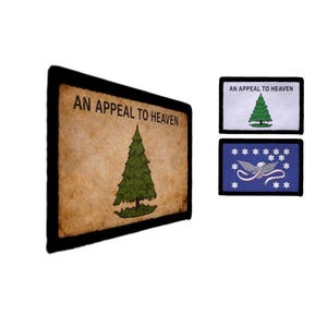 May include: Rectangular patch with the text "AN APPEAL TO HEAVEN" above a green pine tree. The patch has a brown background and a black border. Two smaller patches are also visible, one with a white background and the same text and tree, and another with a blue background and an eagle.