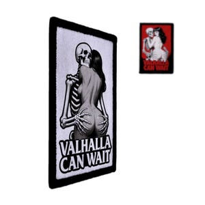 May include: A black and white patch featuring a skeleton embracing a woman, with the text "VALHALLA CAN WAIT". A smaller patch with the same design on a red background is also visible. The patches have a white border.