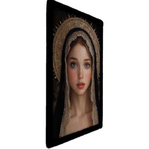 May include: A rectangular art print featuring a portrait of a woman with fair skin, blue eyes, and red hair. She wears a black veil with a gold lace trim and a gold halo. The background is dark.