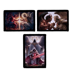 May include: Three rectangular patches with fantasy art. One depicts a devil and an angel facing each other, another shows a devil and angel arm wrestling, and the third features a robed figure with a sword.
