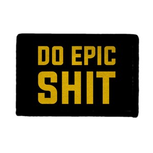 May include: Black rectangular patch with the words "DO EPIC SHIT" in yellow, bold, sans-serif font. The text is centred on the patch, which has a slightly textured appearance.