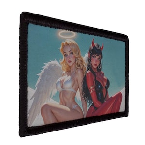 May include: Rectangular patch with a black border featuring an illustration of an angel and a devil. The angel has blonde hair, white wings, and a halo. The devil has red skin, horns, and is wearing black attire. The background is a light blue.