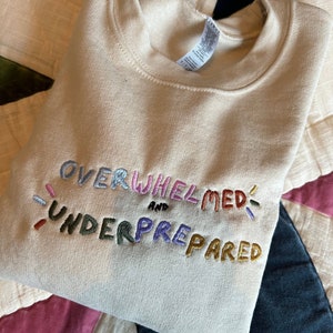 Overwhelmed and underprepared Embroidered Sand Sweatshirt/ T-shirt/ Hoodie/ Tote bag