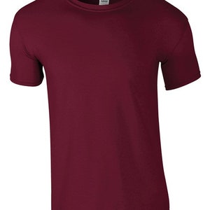 May include: A plain maroon t-shirt with a short sleeve and crew neck.
