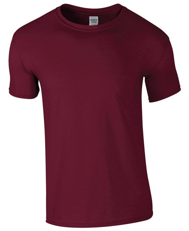 May include: A plain maroon t-shirt with a short sleeve and crew neck.