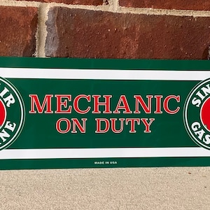 Sinclair Dino mechanic on duty metal garage sign service