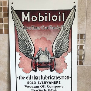 Mobiloil Makes Your Car Fly vintage style sign