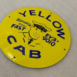 Yellow Taxi Cab porcelain enamel sign