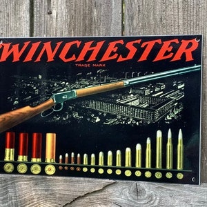 Ciężkie stalowe karabiny Winchester naboje w stylu vintage Metalowy znak