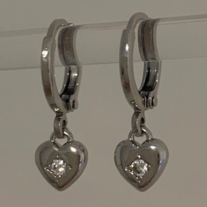 Silver tiny heart huggie earrings