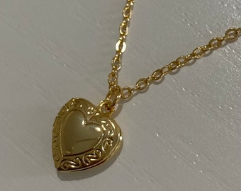 Gold heart locket necklace
