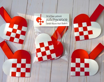 May include: Set of four red and white woven heart baskets, called "Julehjerter", made from cardstock. Danish Woven Heart Baskets.