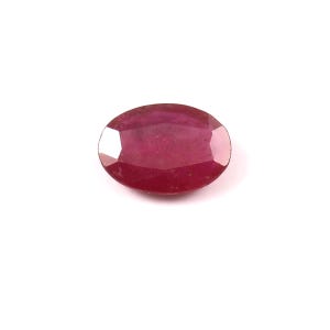 May include: A deep red oval-shaped gemstone with a faceted cut.
